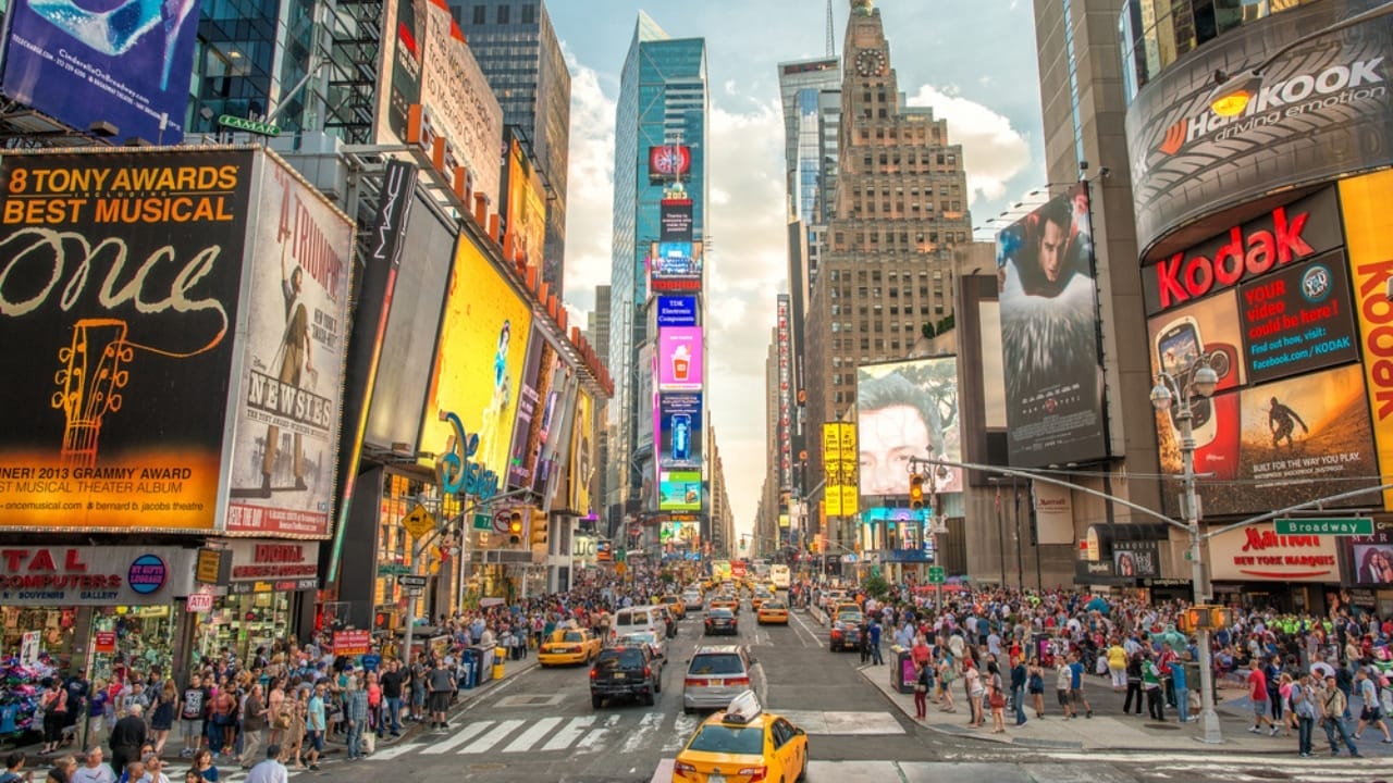 <p>Times Square, often referred to as “The Crossroads of the World,” is one of the most visited tourist destinations globally, attracting approximately 50 million visitors annually. </p> <p>Located at the junction of Broadway and Seventh Avenue, it is known for its massive digital billboards and bustling pedestrian traffic. The area is densely packed with tourists, street performers, and vendors, making it difficult to navigate and enjoy.</p> <p>Moreover, prices for everything from souvenirs to meals are significantly marked up, and the dining options largely consist of overpriced chain restaurants. Street performers and costumed characters often aggressively solicit tips, adding to the commercialized atmosphere. </p> <p>For a more authentic New York experience, visitors might consider exploring neighborhoods like Greenwich Village or Brooklyn, which offer a more relaxed environment and a taste of local culture.</p>