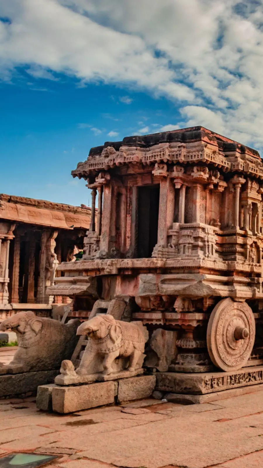 A UNESCO World Heritage Site, Hampi features ancient ruins of the Vijayanagara Empire amidst surreal boulder-strewn landscapes.
