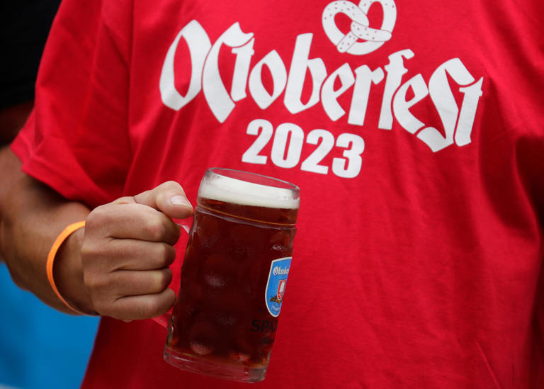 A traditional beer toast at Houdini Plaza is a tribute to the traditional Spaten beer tapping at Oktoberfest in Munich, Germany during Octoberfest Saturday, September 30, 2023, in downtown Appleton, Wis.