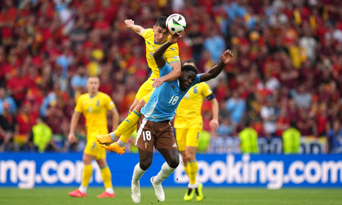 belgium survive nervy end and reach last 16 after ukraine stalemate