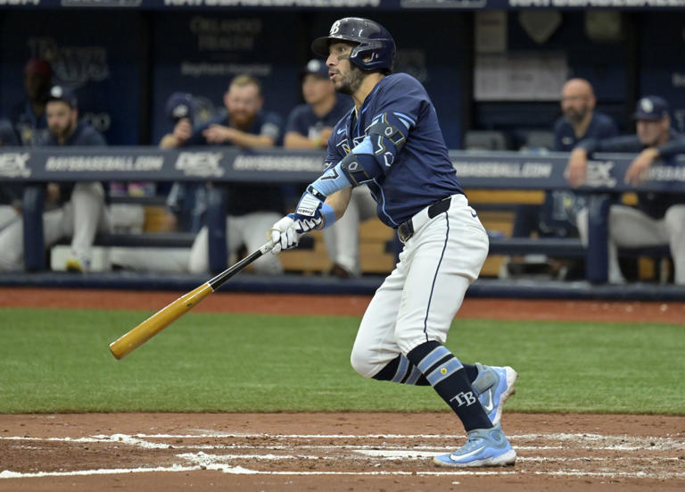 Tampa Bay Rays shortstop José Caballero watches his double to left field off Seattle Mariners starter George Kirby during the third inning of a baseball game Wednesday, June 26, 2024, in St. Petersburg, Fla. (AP Photo/Steve Nesius)