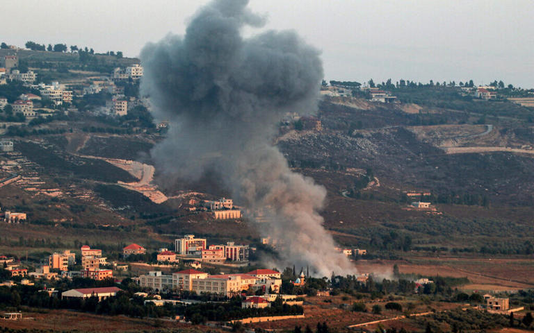 A smoke plume billows during an Israeli strike on the village of Khiam in southern Lebanon on June 23, 2024. (Rabih DAHER / AFP)