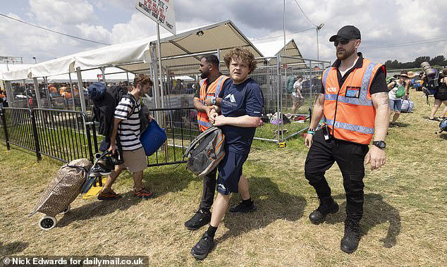 Moment Glastonbury guards tackle man who tried to gatecrash festival