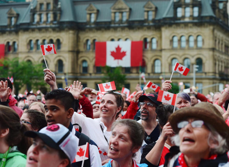 People take in the Canada 150 celebrations on Parliament Hill on July 1, 2017. The party falls on a Monday this year, and there's plenty to do in and around Ottawa.