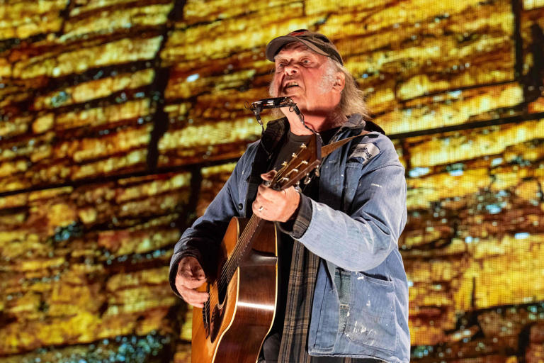 Neil Young performs during the Farm Aid Music Festival at the Ruoff Music Center on Sept. 23, 2023, in Noblesville, Indiana.