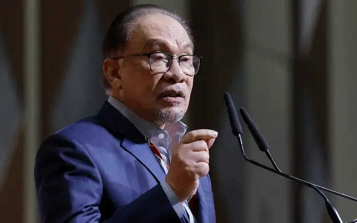 sticks and stones, anwar says on opposition attacks