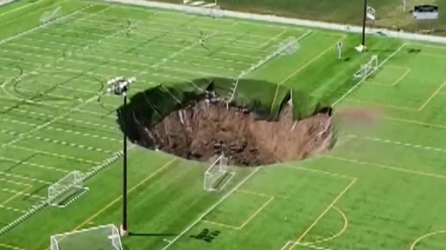 Watch: Massive sinkhole swallows soccer field in Illinois