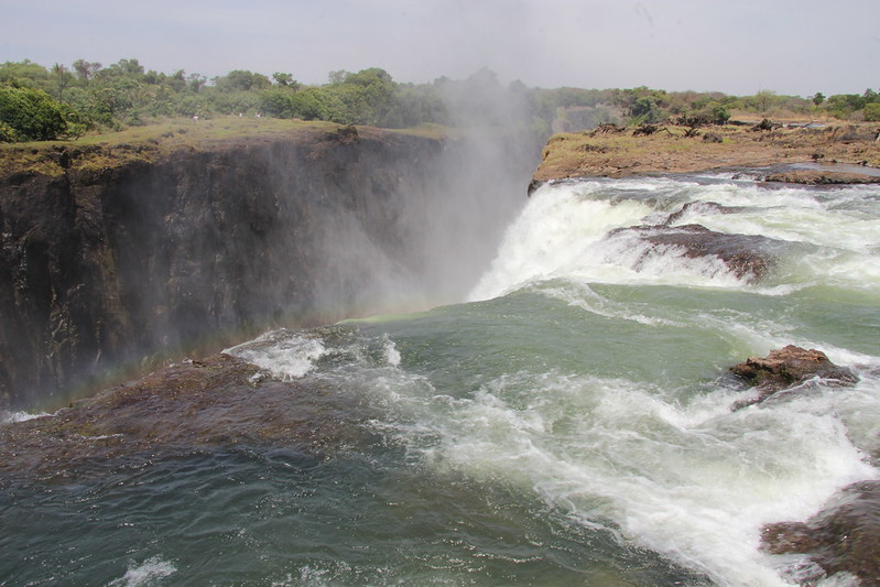 <p>One must <em>really </em>trust their guide in order to enjoy The Devil's Pool. The Zambezi river that you have to navigate to <em>reach</em> the pool is home to<strong> hippos and crocodiles.</strong> It's the guide's job to ensure the waters are clear of these potential dangers before visitors can venture forth.</p>