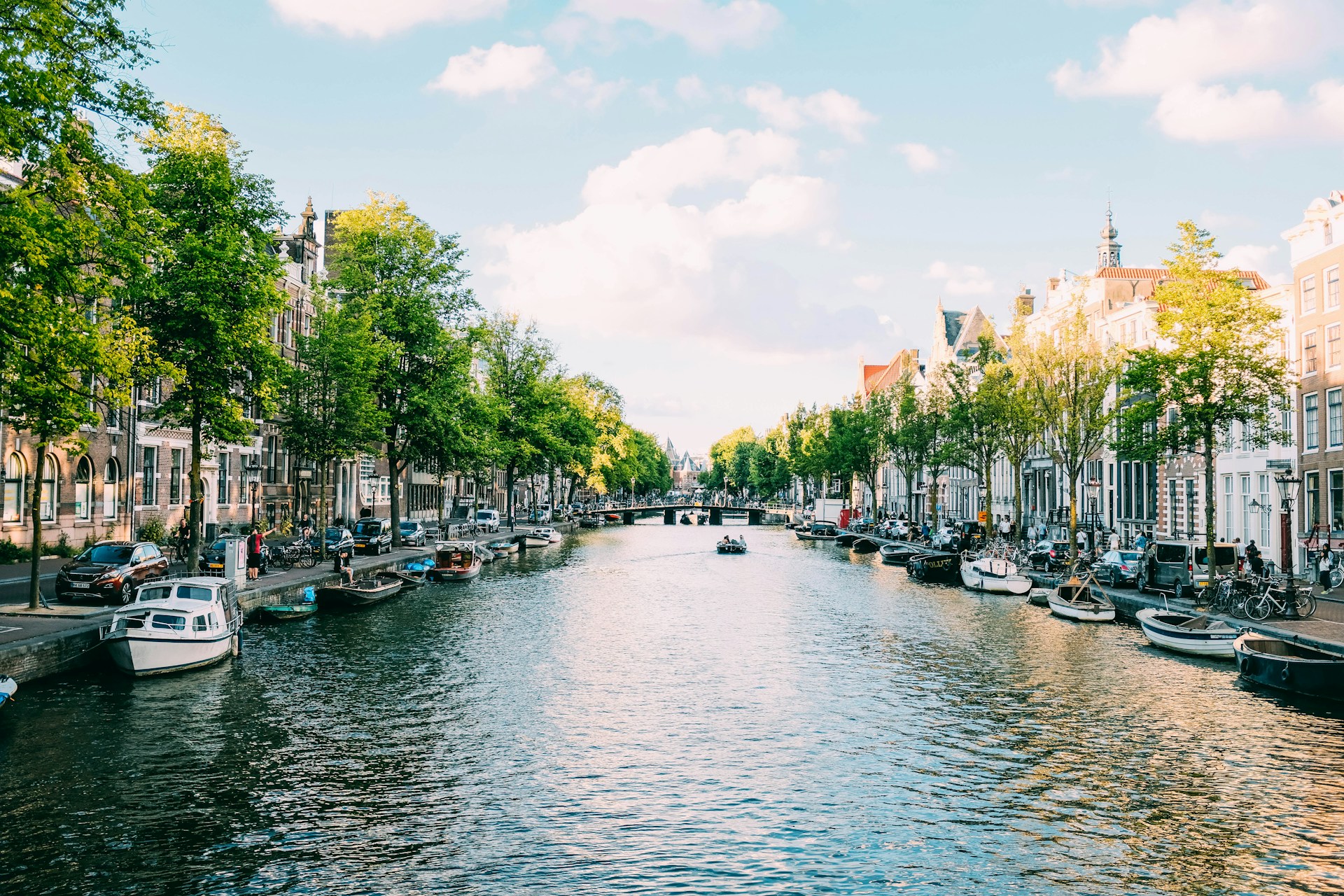 <p>Amsterdam is popular for its extensive canal system, museums, and rich cultural experiences. Its unique coffee shop culture and charming neighborhoods leave a lot to offer tourists.</p>