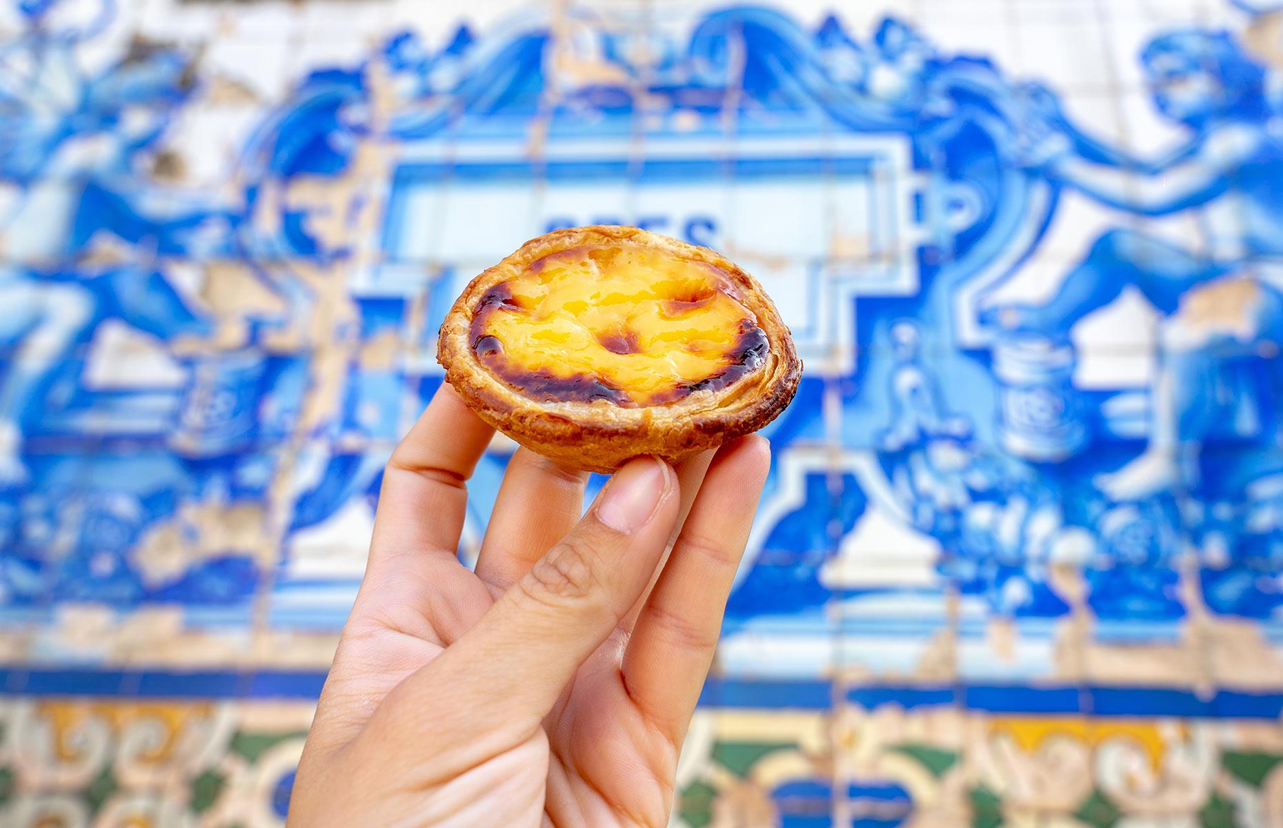 <p>And, of course, there is the globally famous pastel de nata (or pastel de Belém): a sweet egg custard tart served in shatteringly crisp pastry and often dusted with cinnamon. People queue down the street for the most highly sought-after vendors, but every café and bakery will sell them; enjoy them with a short, strong coffee, and as often as you can!</p>