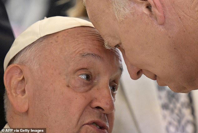 moment president biden and pope francis share a tender moment