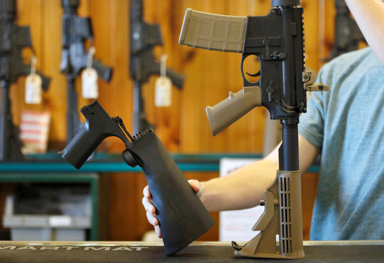 A bump fire stock that attaches to a semi-automatic rifle to increase the firing rate is seen at Good Guys Gun Shop in Orem (George Frey / Reuters file )