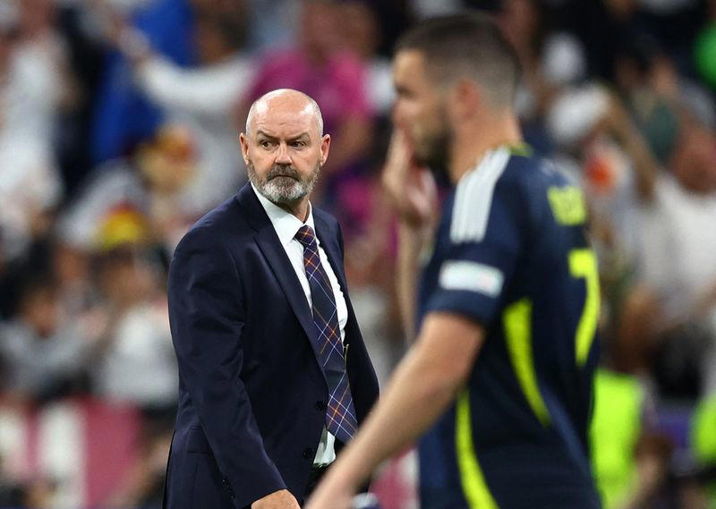 soccer-scotland boss clarke tells fans to keep the faith despite germany thrashing
