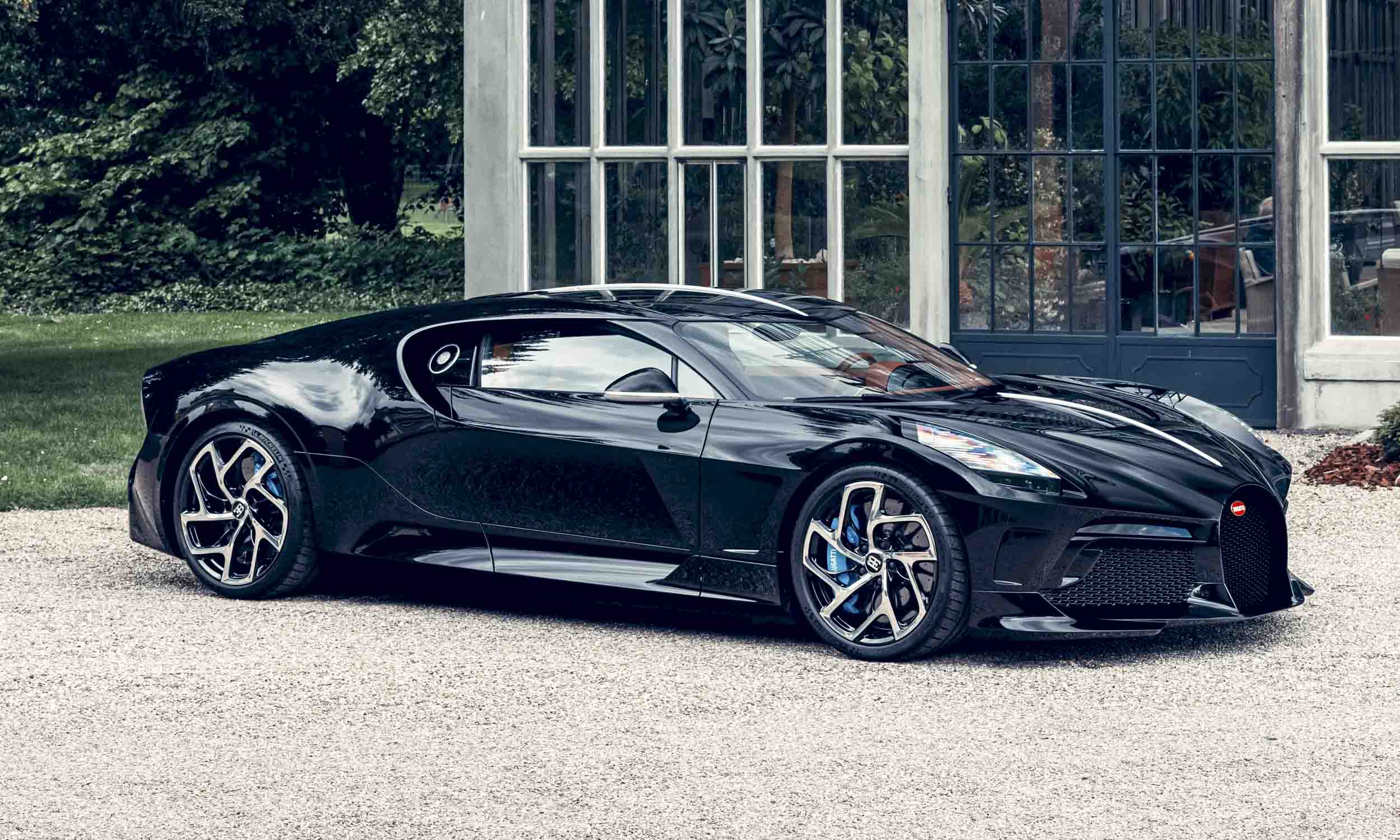 <p>          Total Production: 1 Vehicle<br> Price: €11 million (US$13.4 million)<br> The first look at this handcrafted, one-off piece of mobile art came at its debut on the opening day of the 2019 Geneva Motor Show press preview. La Voiture Noire is a stunning, sleek, grand touring coupe with sculpted bodywork in black carbon fiber produced for a single Bugatti customer. This modern sports car pays tribute to the brand-defining Bugatti Type 57 SC Atlantic.         </p>