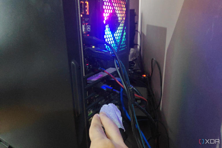 Hold a thin piece of paper near the PCIe slots to test the air pressure