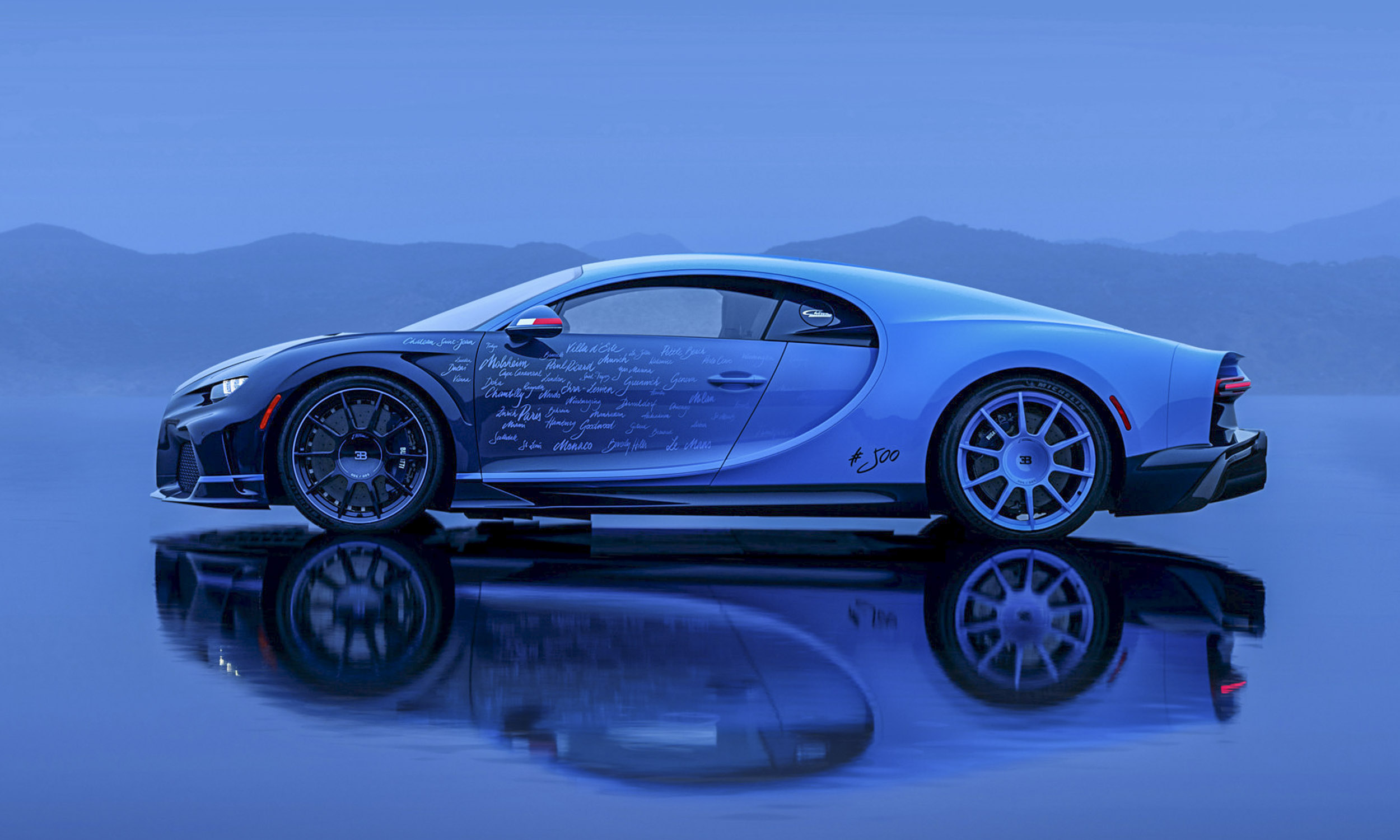 <p>          The Chiron L’Ultime features the same Atlantic Blue and French Racing Blue colors that adorned the first Chiron when it debuted in Geneva, but designers provided a new take on the color scheme. The colors now blend seamlessly together, fading from dark in front to light in the rear. All the places that were significant in the life of the Chiron are hand-scripted on the side of the vehicle. The #500 written ahead of the rear wheel completes the look.         </p>