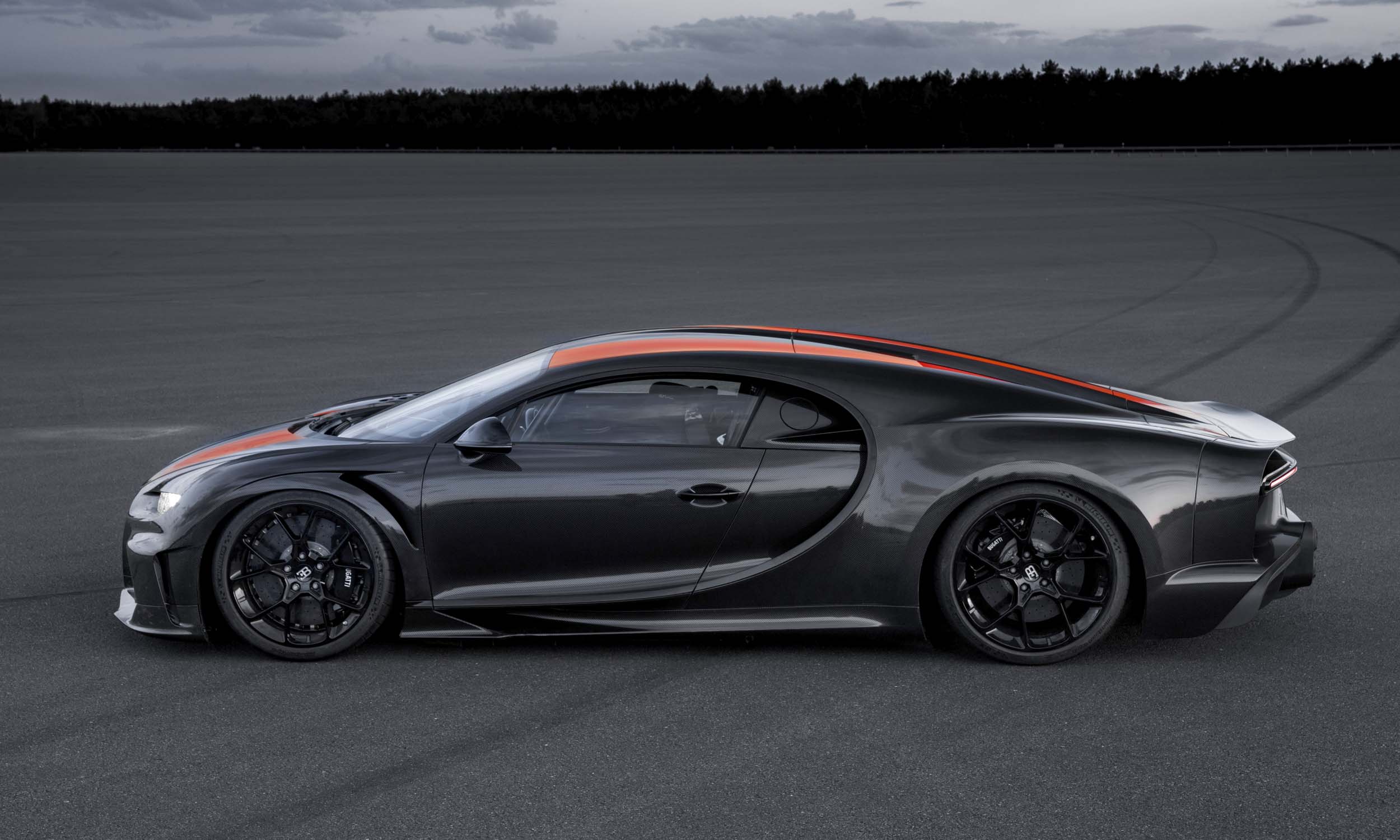 <p>          To commemorate this high-speed achievement, Bugatti created a limited number of Chiron Super Sport 300+ models that mimicked the style of the record-setting model, including exposed Jet Black carbon fiber with Jet Orange racing stripes. This special Chiron also received a power boost, putting out 1,600 horsepower. However, in the interest of safety, speed was limited to “just” 273 mph.         </p>