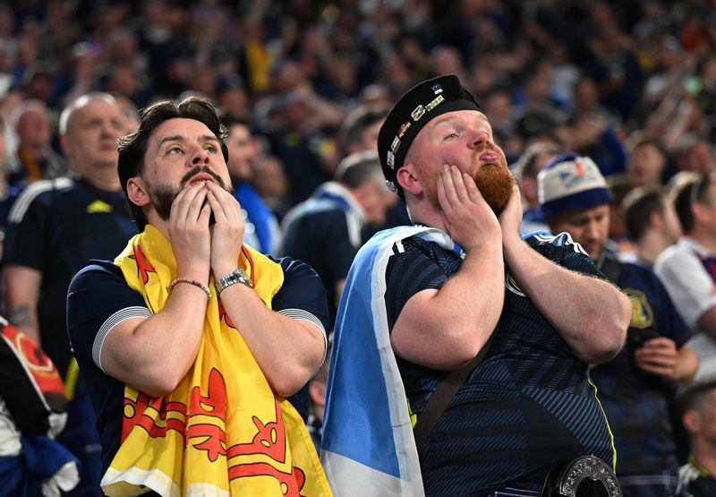 soccer-scotland boss clarke tells fans to keep the faith despite germany thrashing