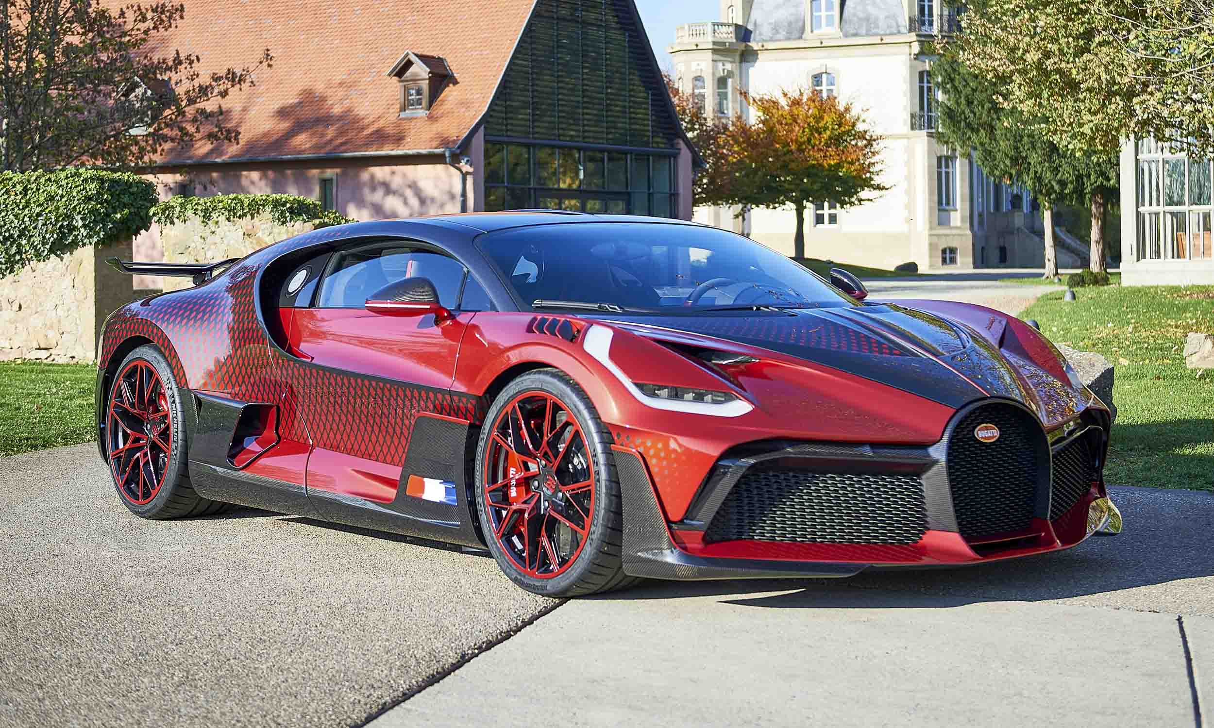 <p>          Total Production: 40 Vehicles<br> Price: €5 million (US$6.1 million)<br> Named for the French racing driver and two-time Targa Florio winner Albert Divo, the Divo was developed to be more agile than the Chiron and optimized for exceptional handling on winding roads or the track. With styling slightly different from the Chiron, the Divo features vertical front lights with daytime running lights on the outer edges, giving it an appearance of greater width. The horizontal split into a lower carbon and an upper matte silver section also makes the Divo look lower and wider. The Divo was lighter with improved suspension, brakes, and downforce, making it the best handling version of the Chiron.         </p>