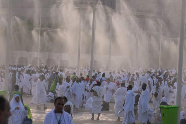 muslim pilgrims converge at mount arafat for worship as hajj reaches its peak