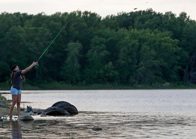 Alyssa Castellano casts out from shore, Wednesday, June 12, 2024, at Bicentennial Nature Area in Lafayette, Ind.