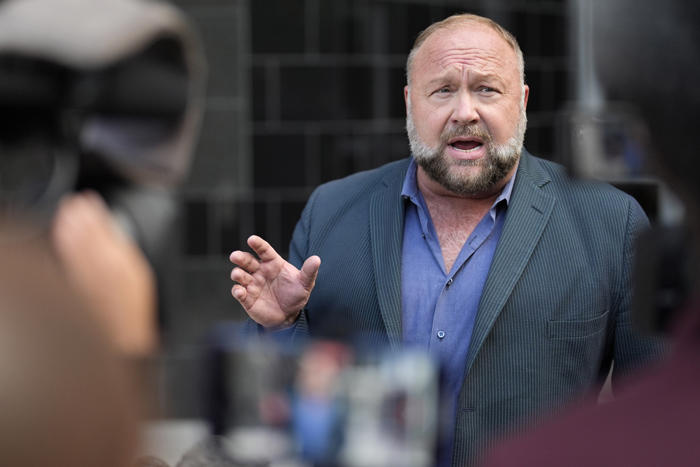 what we know about the fight between conspiracist alex jones and sandy hook families over his assets