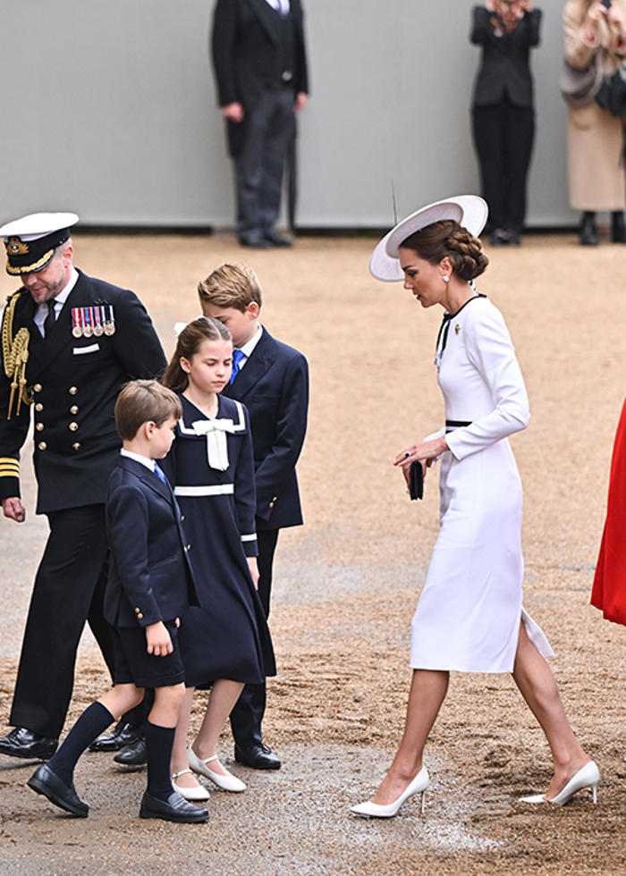 smiling kate middleton supported by her three children at trooping the colour