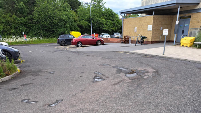 pothole riddled hospital road fixed by local firms