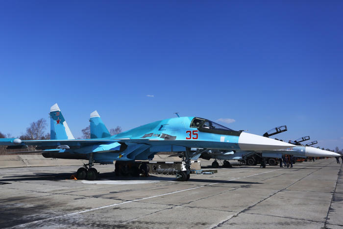 satellite images show aftermath of hit on russian airfield hosting su-34s