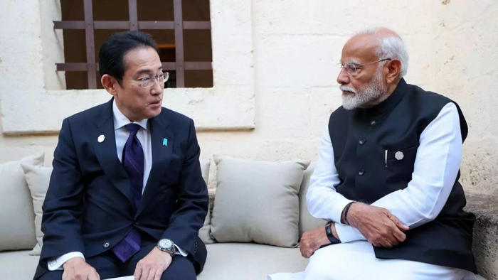 pm modi, japanese pm pledge to speed up bullet train project