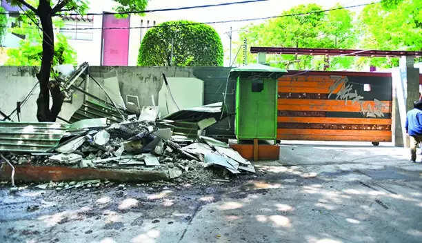illegal rooms for securitymen outside jagan's home razed
