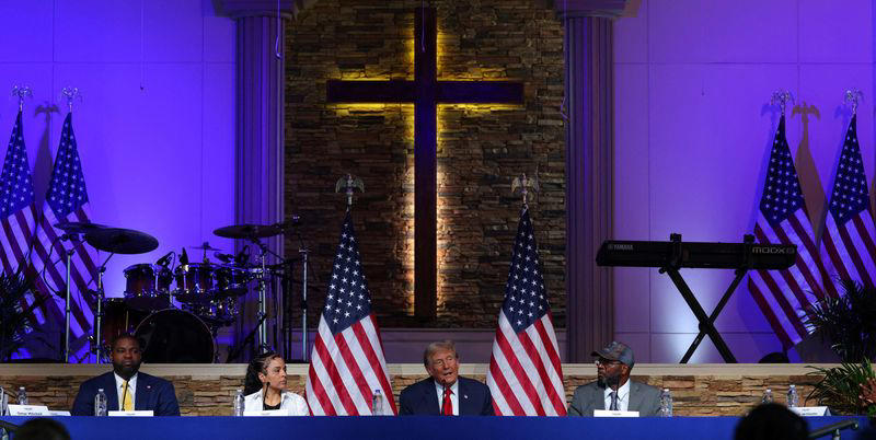 trump visits detroit church in bid to court black voters