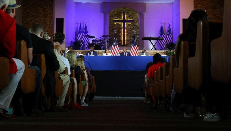 trump visits detroit church in bid to court black voters