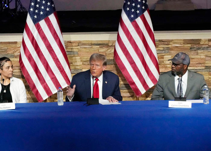 trump blames immigrants for taking jobs as he courts voters at a black church