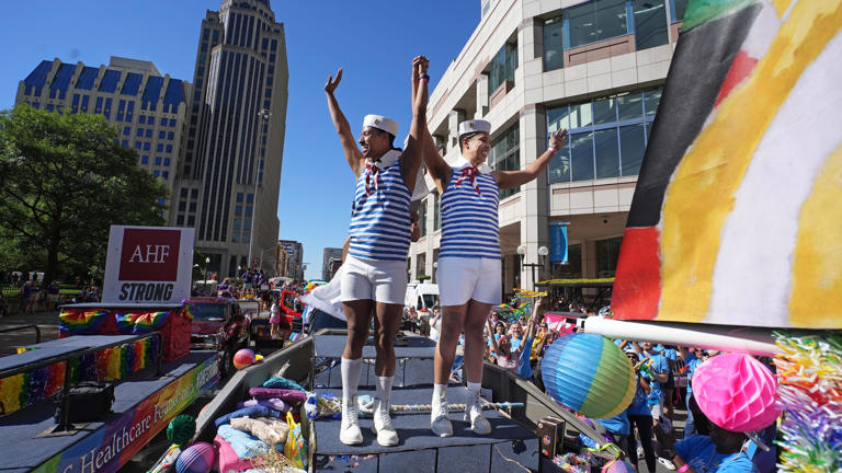 On the Columbus Museum of Art float, Magnus Juliano (left) and Darius Golds celebrate their wedding before the annual Stonewall Pride March through downtown Columbus and the Short North June 15, 2024.