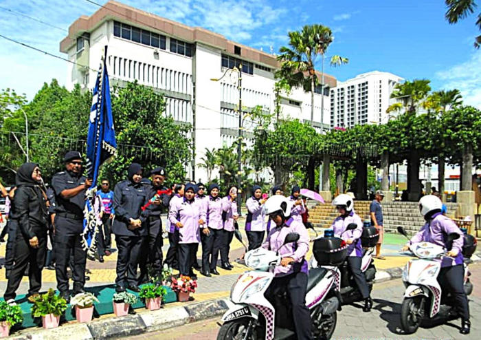 purple-dressed policewomen on motorcycles to make presence felt in kota kinabalu
