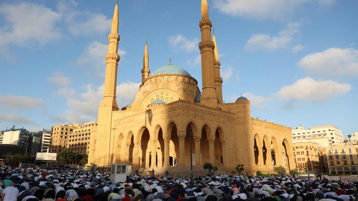 palestinians gather at ruined mosque for eid al adha prayers