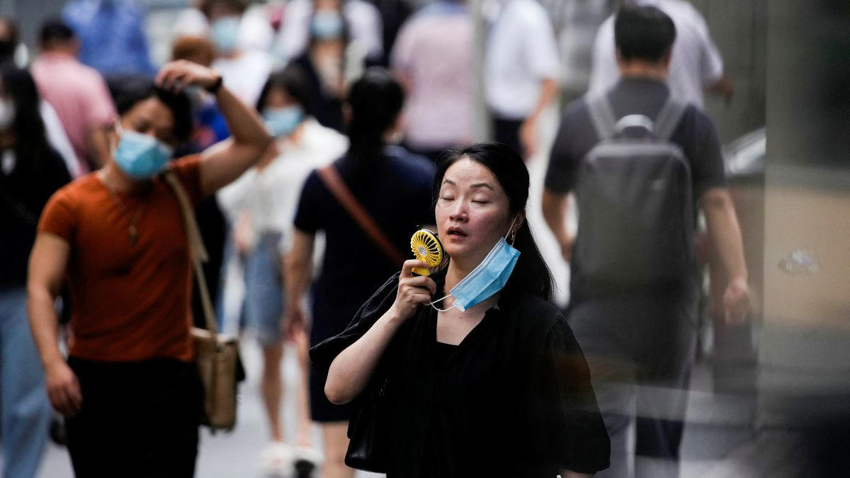 china issues high temperature alert amid sweltering heat and severe flood warnings