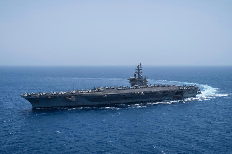 The USS Dwight D. Eisenhower sails in the Red Sea in June 2024. AP Photo/Bernat Armangue