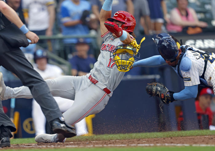 adames homers, perkins throws out tying run at the plate as brewers edge reds 5-4