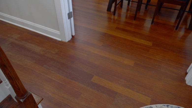 hgtv's hilary farr ditches hardwood flooring for a more durable alternative