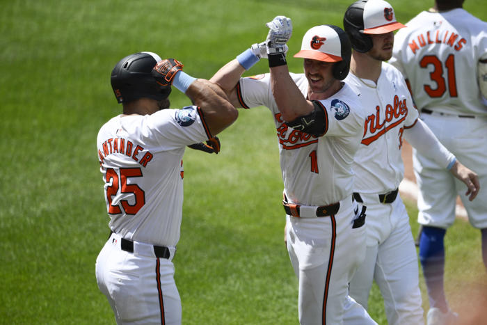 orioles hit 4 hrs off wheeler, beat the phillies 8-3 to take 2 of 3 in the series