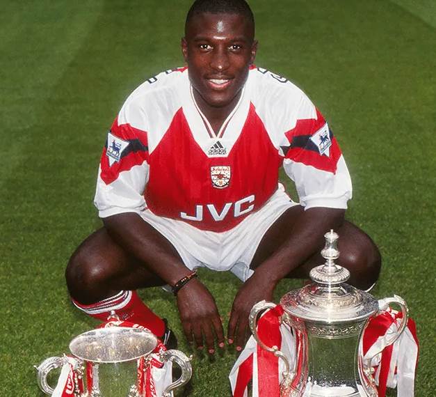English professional footballer who played as a striker for several clubs, including Arsenal, Nottingham Forest, Everton, and Trabzonspor. He was born in Lambeth, England, and began his career with Arsenal in 1988. Campbell won several titles with Arsenal, including the First Division title in 1990-91, the FA Cup and League Cup in 1992-93, and the European Cup Winners' Cup in 1993-94. He later played for Everton, where he scored 83 goals in 13 Premier League seasons and became the club's fifth-highest Premier League goal scorer. Campbell also had a brief stint in Turkey with Trabzonspor and played for West Bromwich Albion and Cardiff City later in his career. After retiring from football, he went on to have a successful media career, working as a pundit for Sky Sports. He passed away at the age of 54.