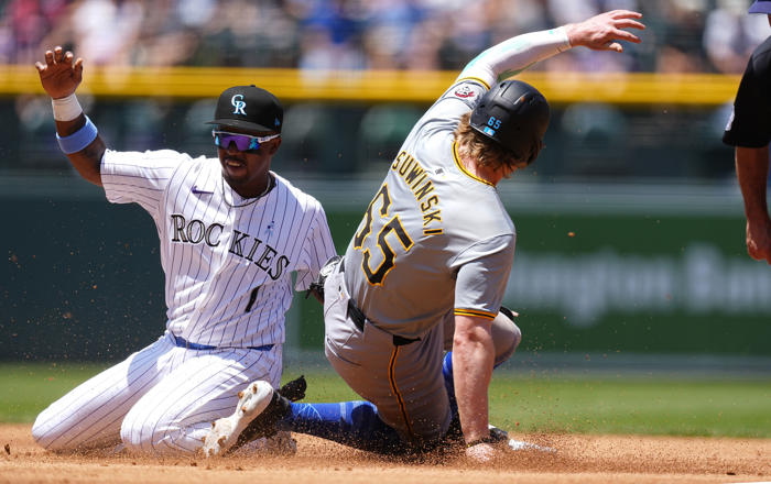 triolo and delay combine for 5 rbis in the 6th as the pirates beat the rockies 8-2