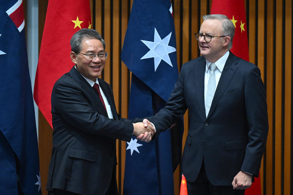kina och australien ger relationen en chans
