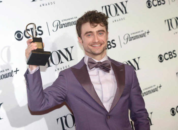 daniel radcliffe makes rare emotional comment about partner and son as he wins first tony