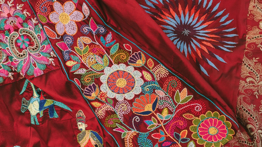 global red dress embroidery project returns to somerset