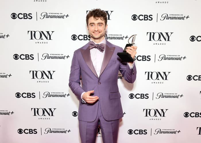 daniel radcliffe lands first tony award as angelina jolie and jeremy strong win big on the night
