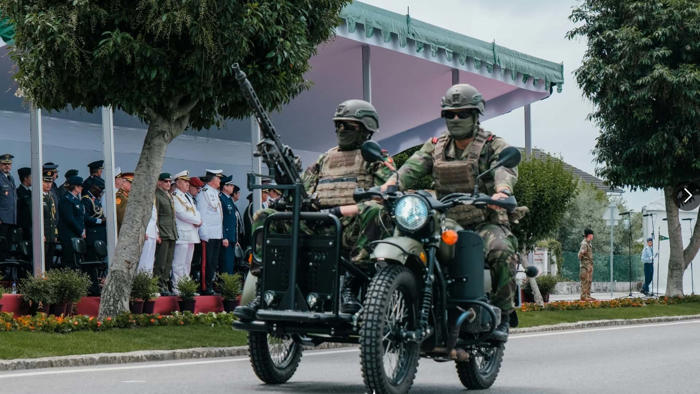 check out this machine gun mounted to a portuguese military motorcycle sidecar
