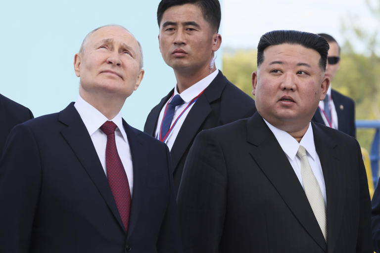 FILE - Russian President Vladimir Putin, left, and North Korea's leader Kim Jong Un examine a launch pad of Soyuz rockets during their meeting at the Vostochny cosmodrome outside the city of Tsiolkovsky, about 200 kilometers (125 miles) from the city of Blagoveshchensk in the far eastern Amur region, Russia, on Wednesday, Sept. 13, 2023. North Korean leader Kim hailed the country's relationship with Russia on Wednesday, June 12, 2024, as reports suggest that Russian President Putin will soon visit the isolated country for his third meeting with Kim.(Mikhail Metzel, Sputnik, Kremlin Pool Photo via AP, File)